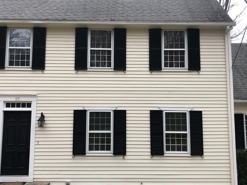 Single pane double hung window with storm windows